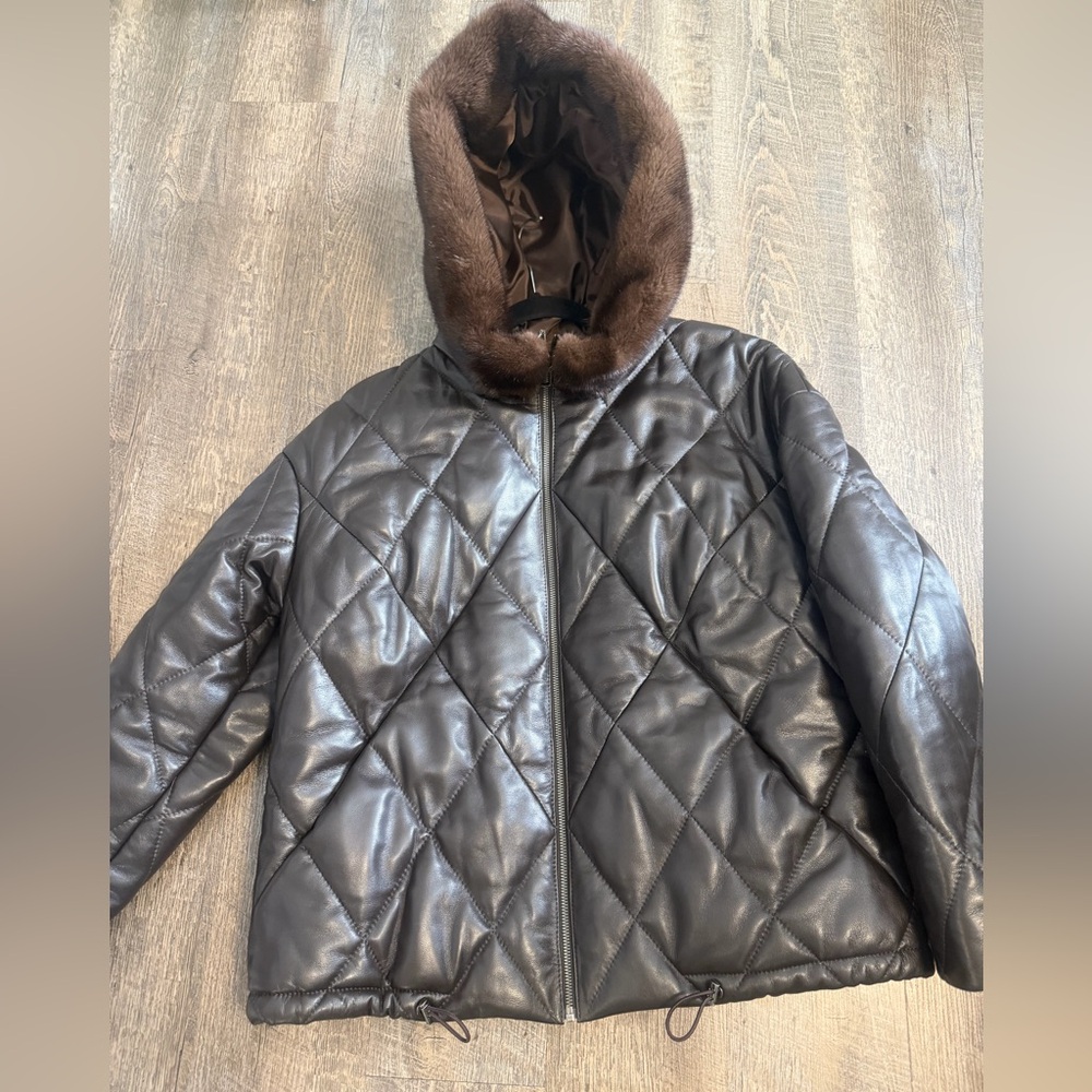 Real leather winter jacket with real mink on a hood